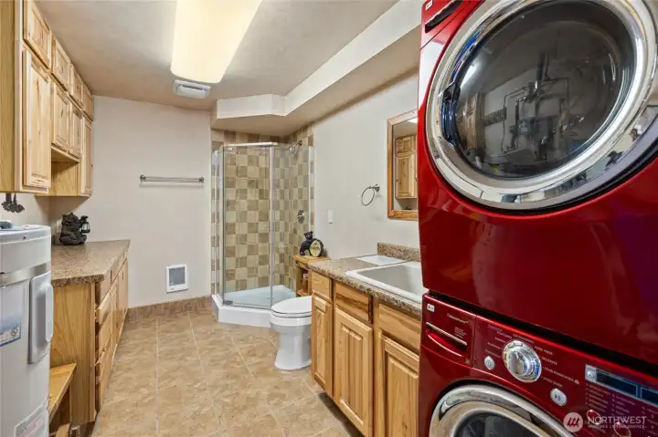 Back on the main level is the bathroom/utility room, complete with washer & dryer.