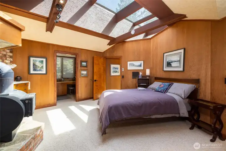 A private, elevated retreat featuring a full bath, pristine water views, and a cozy fireplace with a Fidalgo stone slab hearth. A private, elevated retreat featuring a full bath, pristine water views, and a cozy fireplace with a Fidalgo stone slab hearth.