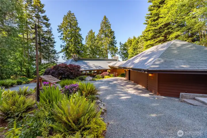 An oversized, fully insulated and paneled 2-car garage equipped with a dedicated propane heating system. An oversized, fully insulated and paneled 2-car garage equipped with a dedicated propane heating system.