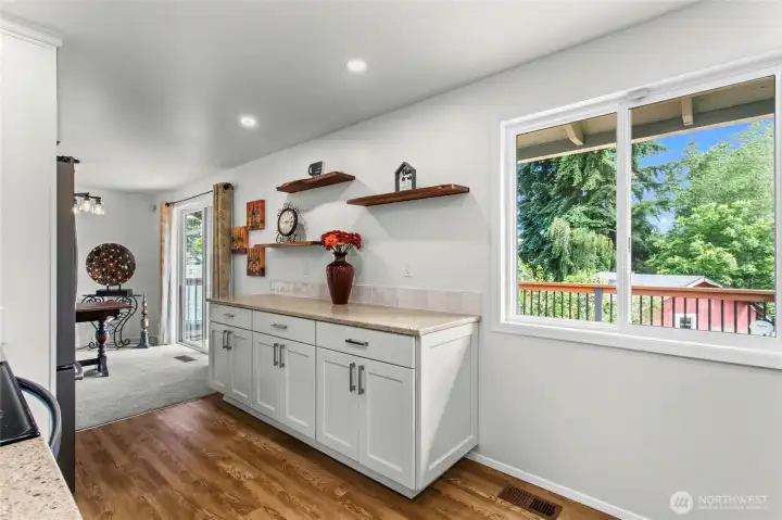 Beautiful updated kitchen with custom live edge shelves. Updated in 2021