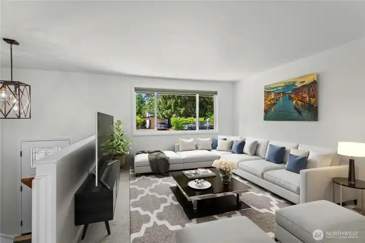 Photo digitally staged * Beautiful living room upstairs  flows right into dining area