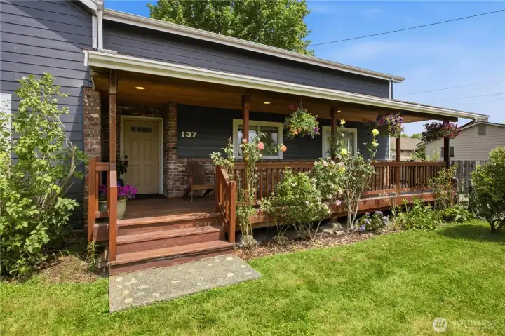 A welcoming front porch invites slow mornings and evening conversations.