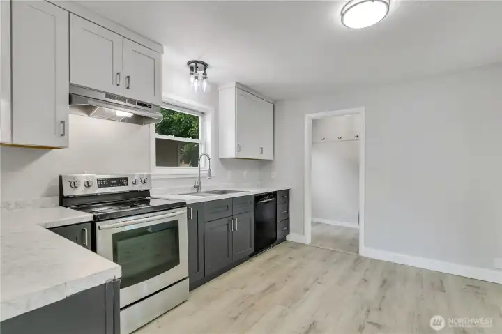 Updated cabinetry provides abundant storage and organization.