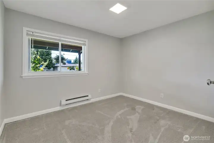 Main floor bedroom with flexible options.