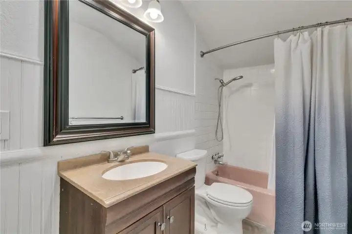 Upper level full bath adds convenience and functionality.