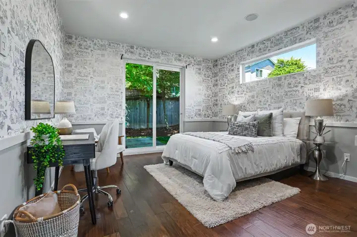 Walk out to the back patio from the bedroom on the main floor! Walk out to the back patio from the bedroom on the main floor!