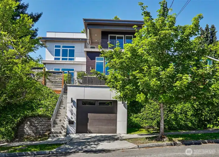 Street-level view of the property. Street-level view of the property.