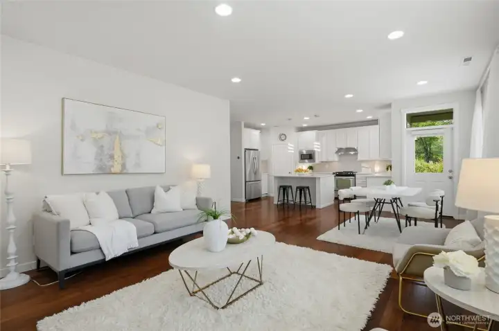 Open concept great room, dining area, and kitchen keeps everyone gathered together.