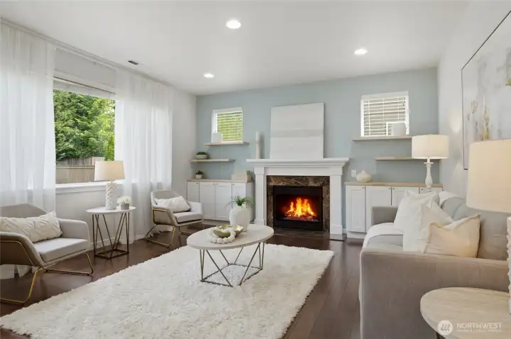 Comfortable living area with gas fireplace and newer custom builtins!