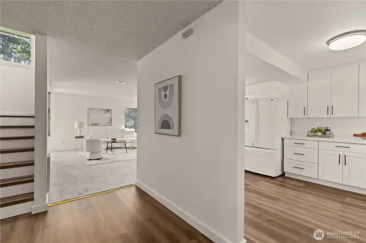 Stairs to  2nd Flr w/ split of Kitchen & Living rm
