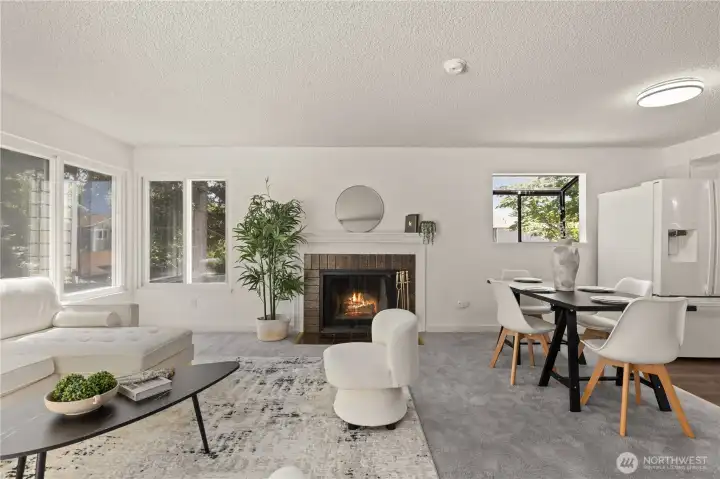 Living rm + fireplace + Large Windows for natural light