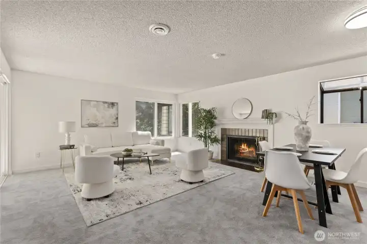 Living rm + fireplace + Large Windows for natural light + Partially covered Deck through double glass sliders