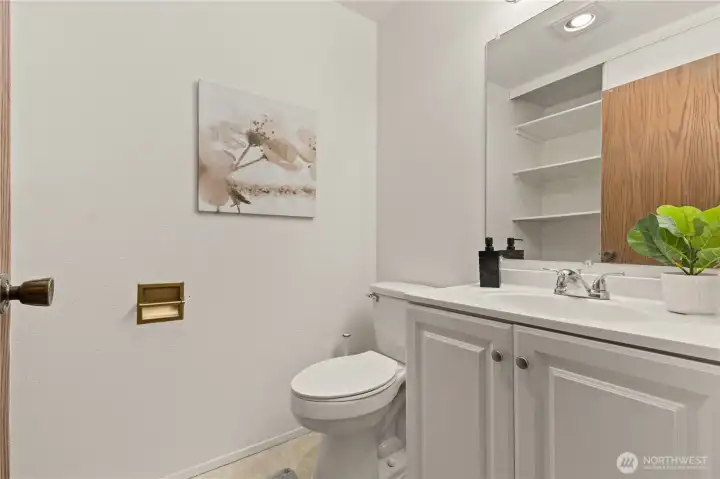 Main Flr - Half-bathroom w/ storage + H2O Heater
