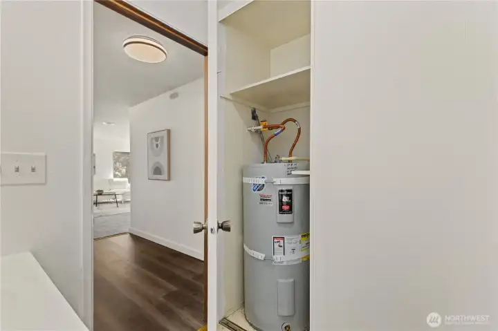 Main Flr - Half-bathroom w/ storage + H2O Heater