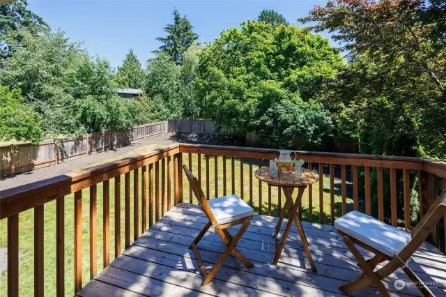 Newer deck overlooking the private fully-fenced yard.