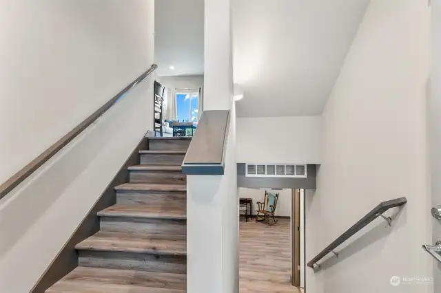 Let's go upstairs from this carport entrance to the living area and kitchen.