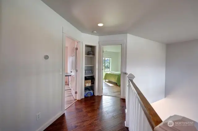 2nd floor landing with access to all 3 upper bedrooms and a full bath.