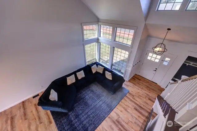 From the 2nd floor landing looking into the great room and main entrance.