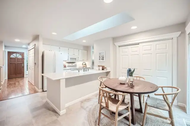 Bright kitchen with 2 pantries, breakfast bar and brilliant skylight.