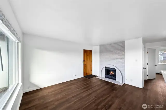 Remodeled & updated throughout! New Flooring, wood burning fireplace, fresh paint!