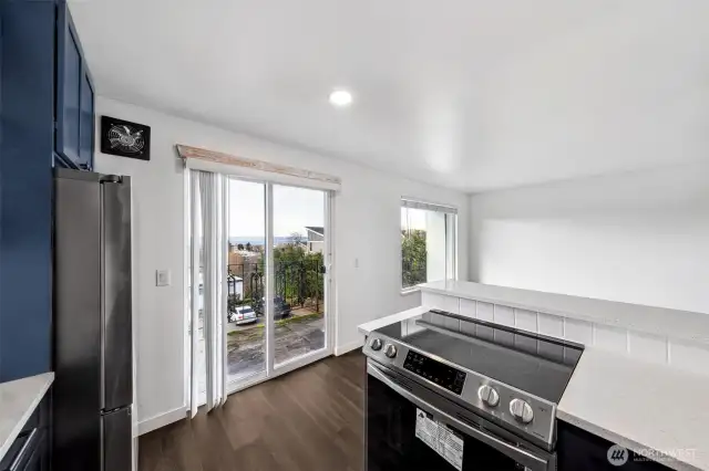 Don't miss a minute of the view from the living room & the kitchen areas.