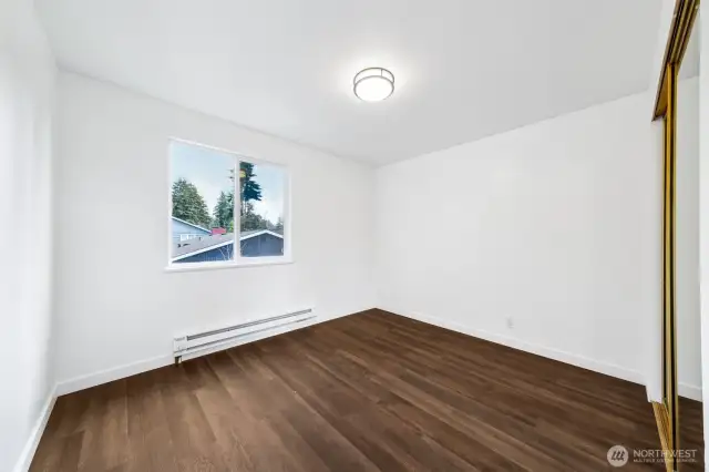 Bedroom #1-fresh paint throughout & NEW LVP flooring!!