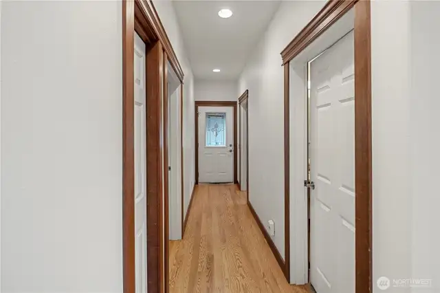 Downstairs hall will take you to plenty of storage, bedroom on the main, sunroom, mudroom and 3/4 bath.