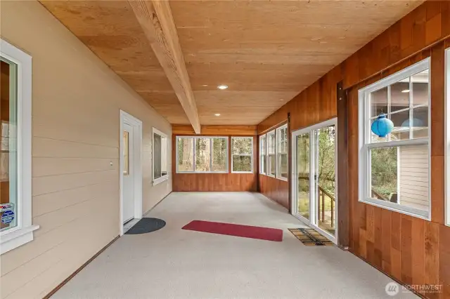 Sunroom on the main between the garage and breezeway.