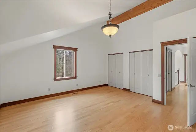 Upstairs primary bedroom with dual closets and a walk in (not shown)