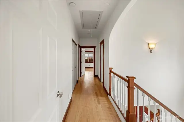 Upstairs Hallway looking into second bedroom from Primary bedroom.