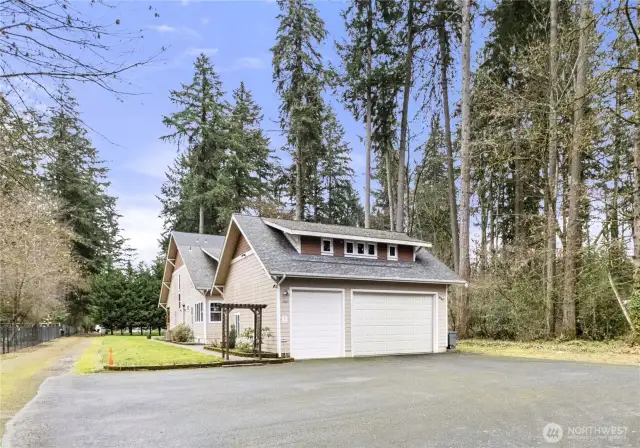 Spacious garage with loft on over an acre close to Spanaway Lake.