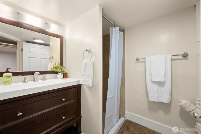 Downstairs bathroom with a shower