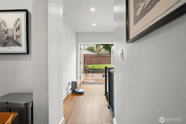 French door opens onto a beautiful backyard and makes the in and out living a breeze