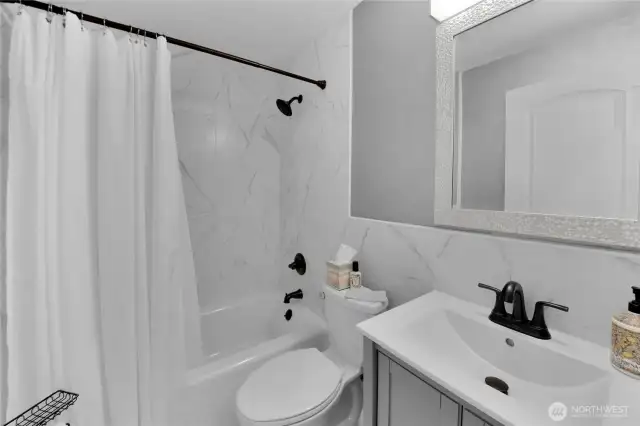 BR 2's bath on lower level. . .