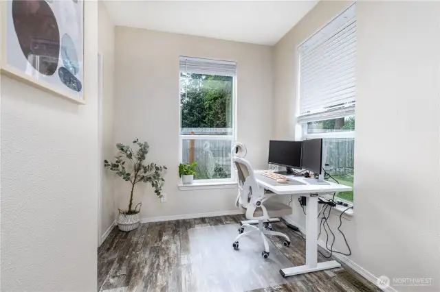 Eat in kitchen space is being used as office space