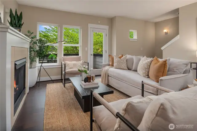 A very versatile living room with great natural light and a view deck just off the french door.