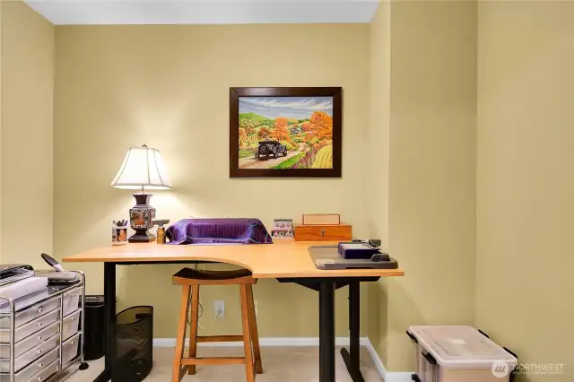 Office hideaway, with access door to huge, lighted, carpeted wraparound storage area.