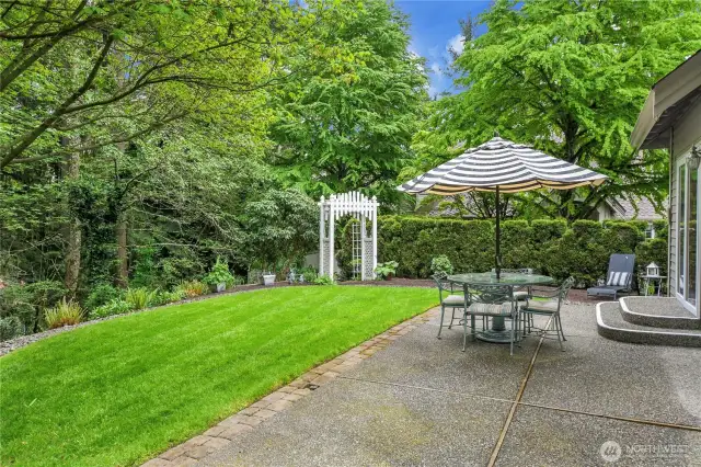 Rain Bird® replaced in 2023: two zones in front and two zones in back. Convenient, extended aggregate walkway from front to back. Storage shed in back. Private back yard with garden arbor. Raised garden beds.