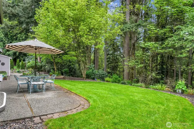 Rain Bird® replaced in 2023: two zones in front and two zones in back. Convenient, extended aggregate walkway from front to back. Storage shed in back. Private back yard with garden arbor. Raised garden beds.