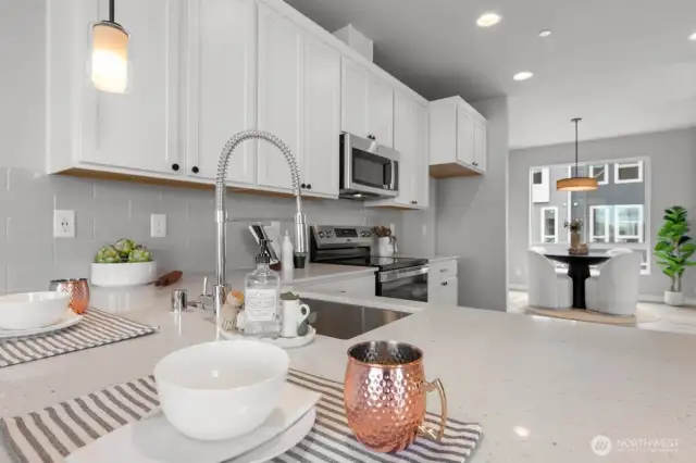 Photographs are for illustrative purposes only. Features, finishes, interior/exterior colors, landscaping and floorplan shown may vary from actual homes built.