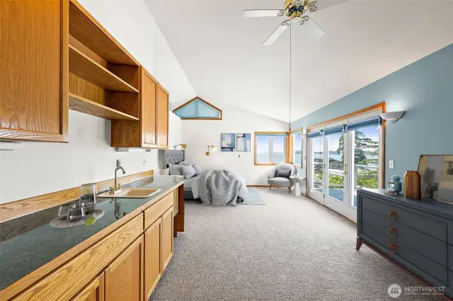 Primary Suite with Wet Bar & French Doors to the Balcony