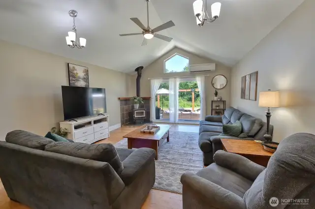 Living room has sliding door to back patio area.