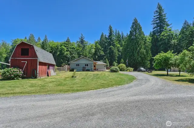 Property has a wonderful mix of sun and shade with mature trees and open sunny yard.
