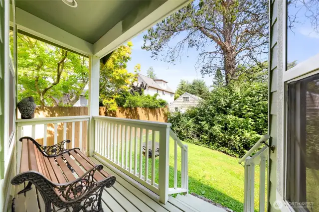 The view of your charming back yard from one of two back decks.