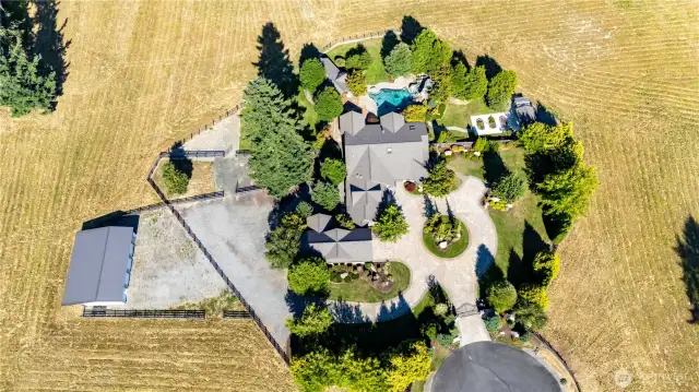Great view of this amazing Gated Estate! SHOP TO THE LEFT DOES NOT CONVEY WITH THE HOME.