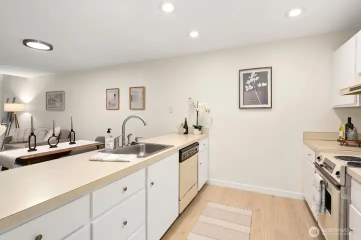 Don't get locked away in the kitchen!  Open plan allows you to stay connected while you cook - enjoy chatting, TV and lake views from your cooking space.