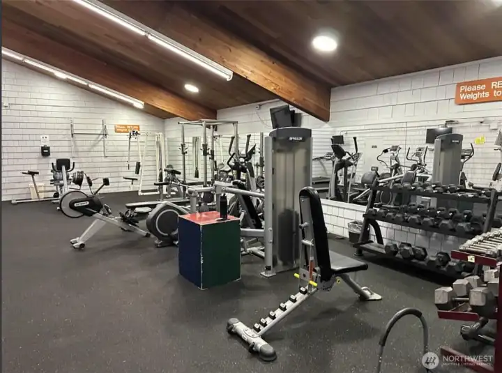 Well-supplied gym and sauna in the health center to the right (far side) of the main club house near your unit.