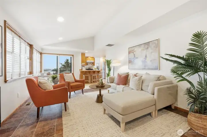 @nd living room with gas fireplace and access to the view deck