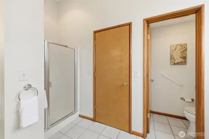 Shower and toilet room in primary bathroom
