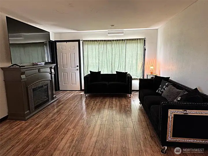 Living room with Laminate wood flooring